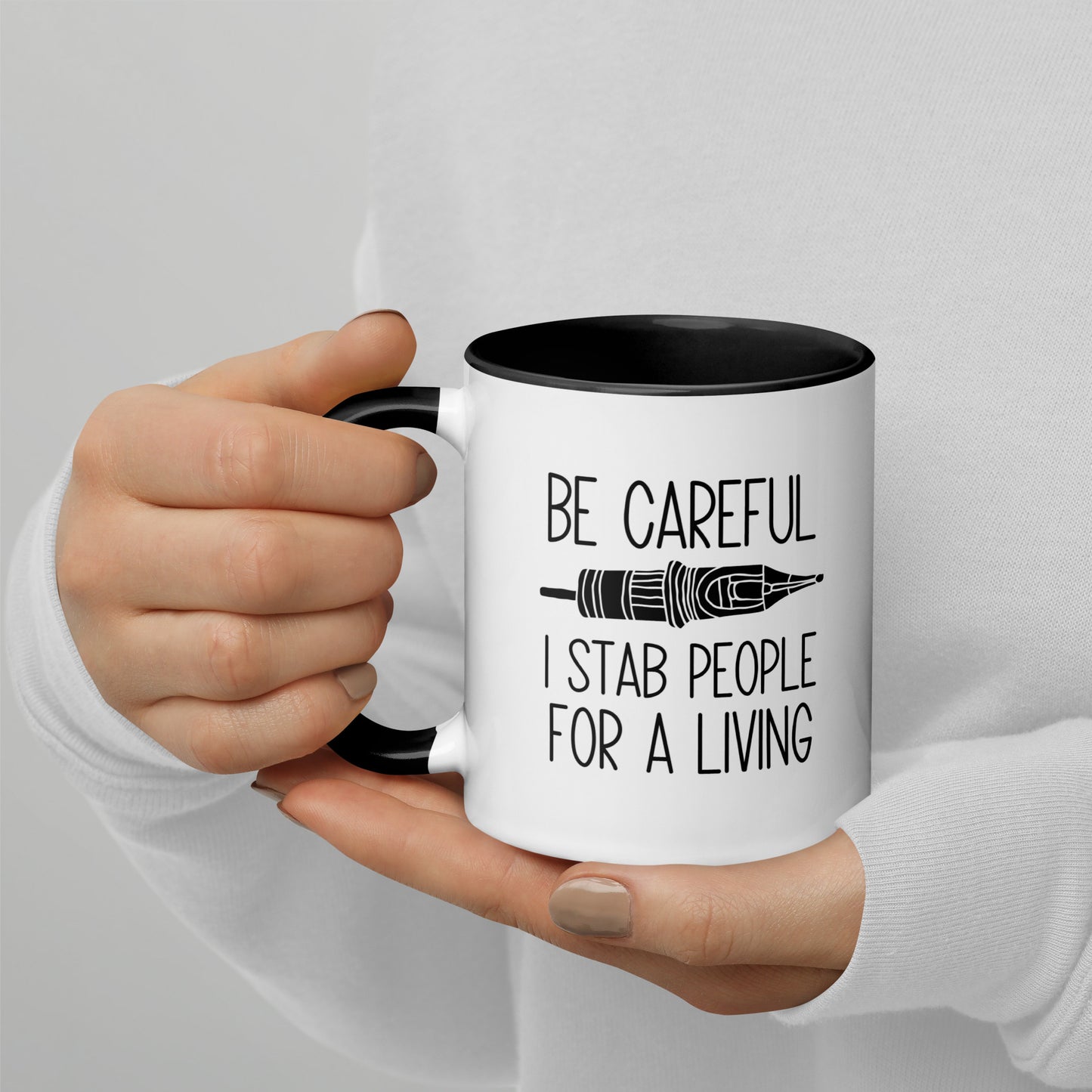 BE CAREFUL I STAB PEOPLE FOR A LIVING Mug